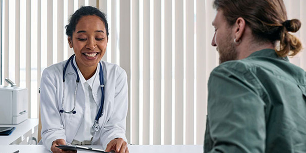 photo of a doctor discussing with the patient