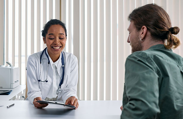 photo of a doctor discussing with the patient