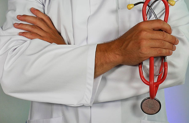 photo of a doctor holding a stethoscope