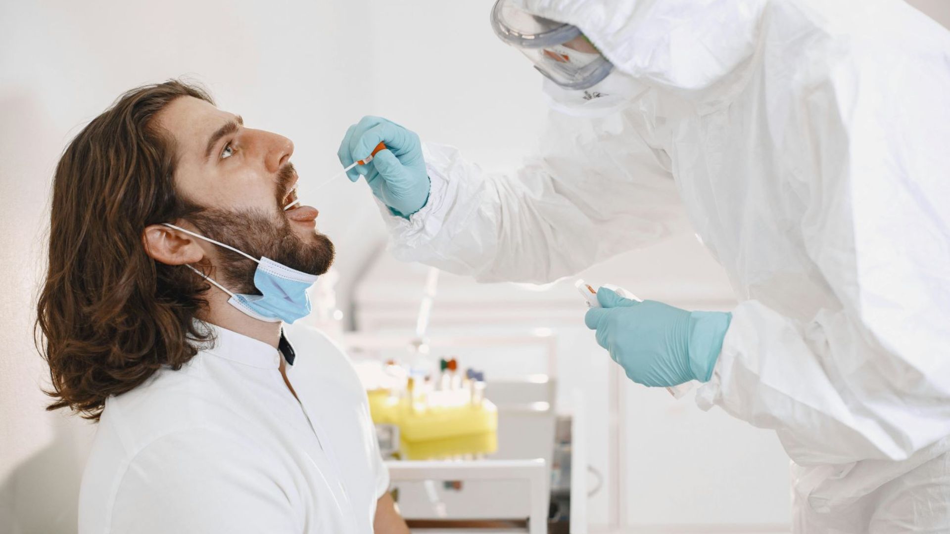 a person having saliva testing