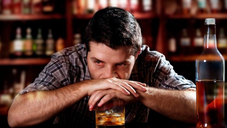 alcohol addiction at bar of pub