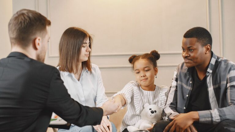 A family in a thoughtful counseling session