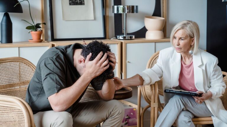 A supportive therapist provides comfort