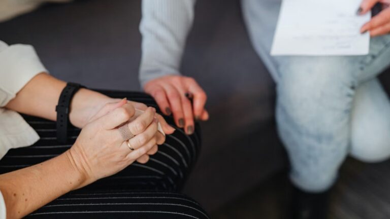 two people comforting each other